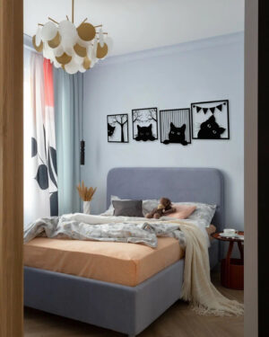 Charming Cat Silhouette Wall Decor in a Modern Bedroom