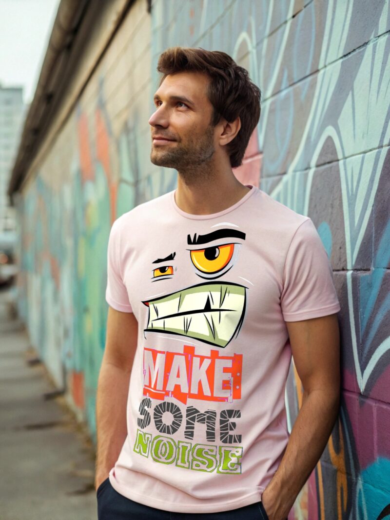 A pink T-shirt featuring a cartoon face with sharp teeth and bold "MAKE SOME NOISE" lettering.