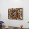 Multi-layer wooden mandala wall art displayed on wall in modern interior