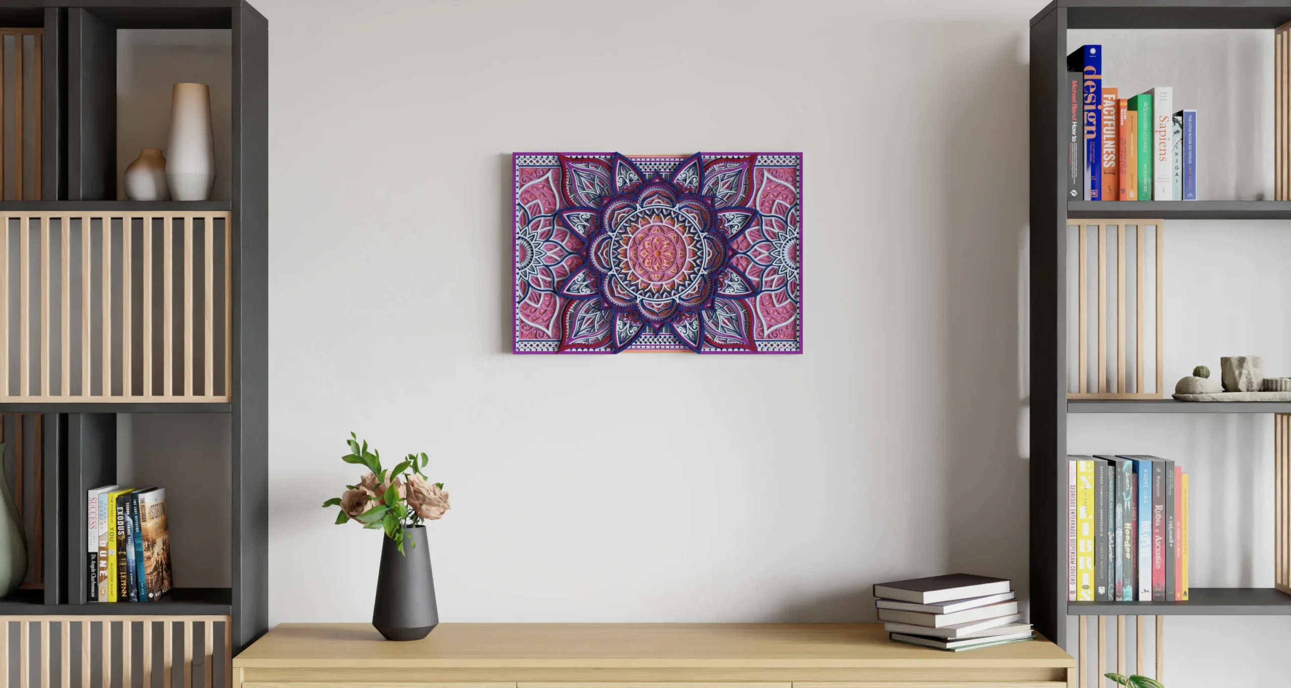 Multilayer wooden mandala wall decor in pink, purple and blue displayed on a light wall between two shelving units