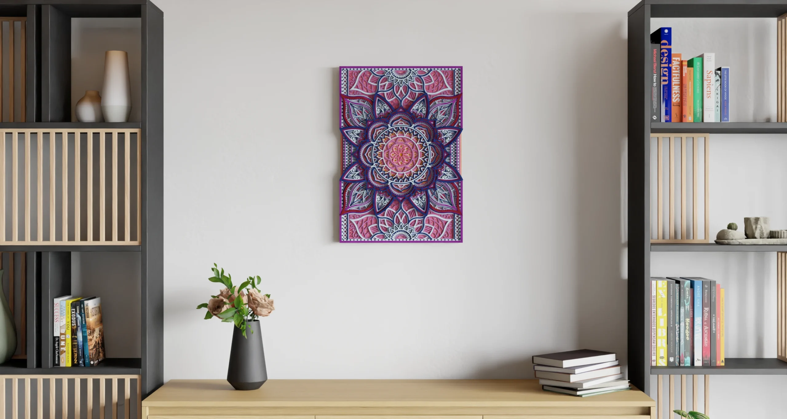 Vertical rectangular multilayer wooden mandala wall art in pink, purple, navy, white, and black, featuring an intricate floral geometric design displayed on a light wall