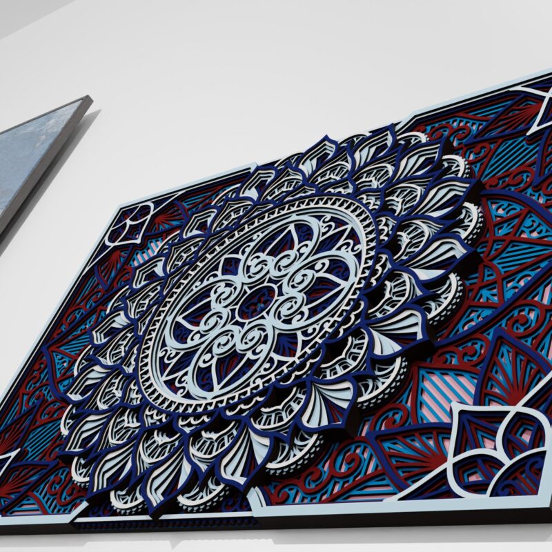 Low-angle close-up of a Multilayer Wooden Mandala with a blue, white, and red symmetrical design and clearly visible layered depth.