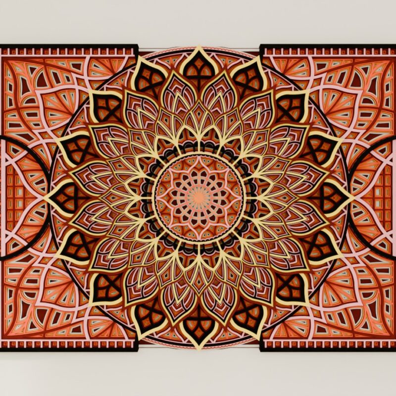 Close-up of a Multilayer Wooden Mandala in coral, black, and cream tones with a symmetrical layered design
