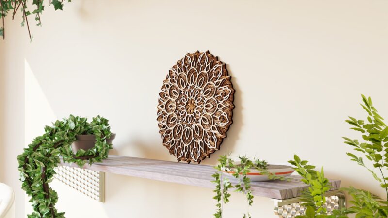 Multilayer Wooden Mandala wall decor in natural wood tones displayed on a wall above a shelf in a styled interior