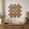 Walnut colored Celtic Knot wooden wall decor displayed above a wooden cabinet in a neutral interior