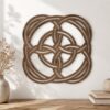 Celtic Knot wooden wall decor in a warm wood finish displayed on a neutral wall above a wooden console table