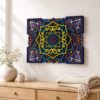 Colorful multilayer wooden mandala wall art displayed above a light wood dresser in a neutral interior.