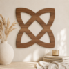 Close-up of walnut Celtic knot wall decor displayed in a warm neutral interior