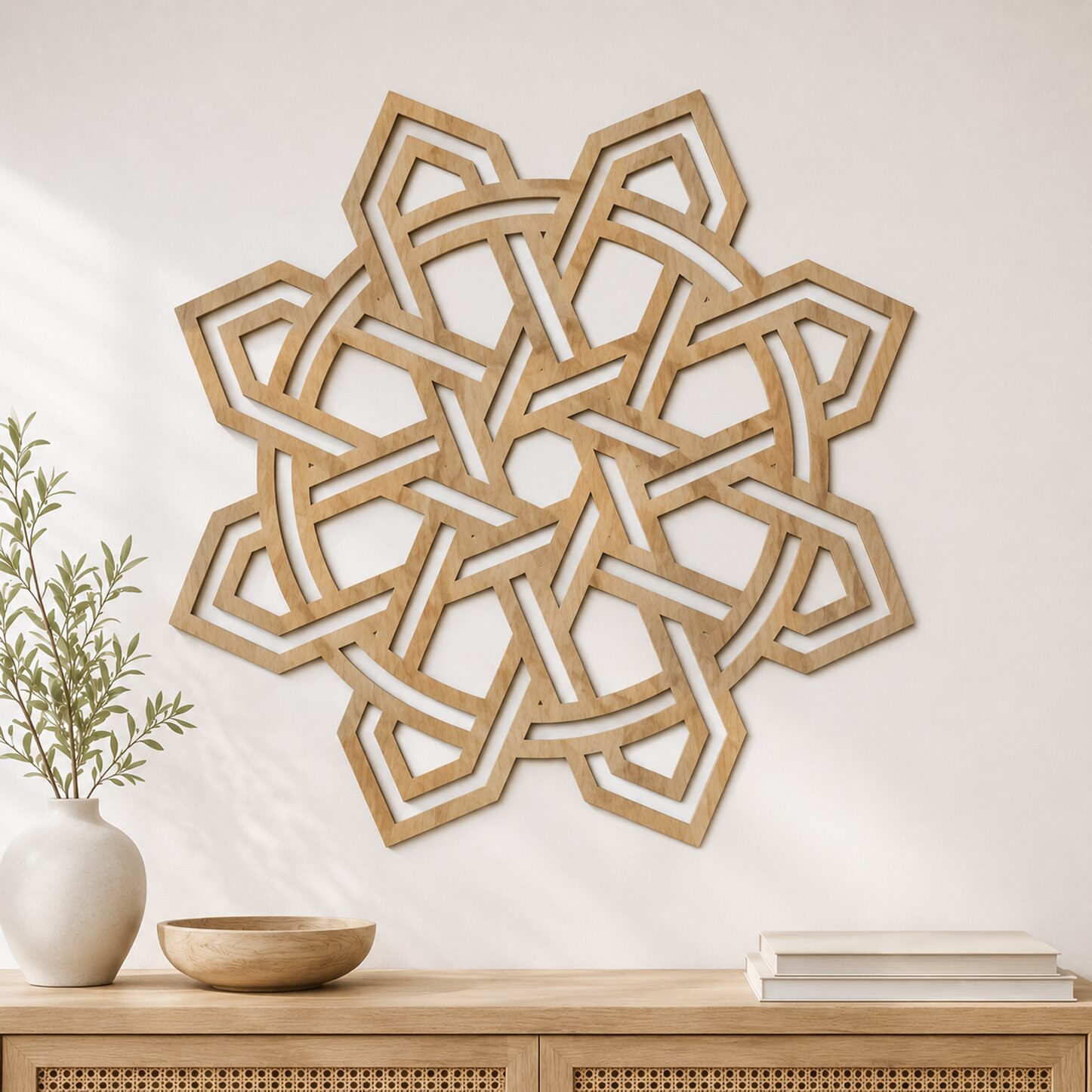Geometric Celtic Knot wall decor in a light oak finish displayed above a wooden console in a warm neutral interior.